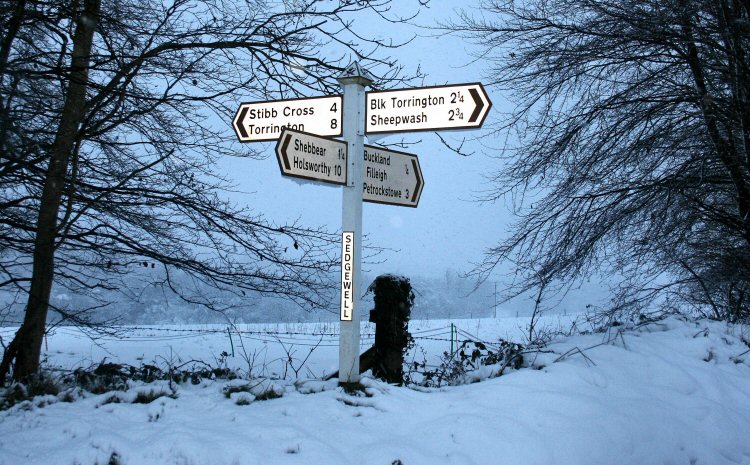 Sedgewell Cross sign post in snow